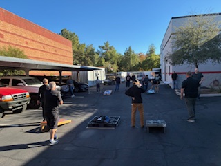 bryce fastener team playing corn hole
